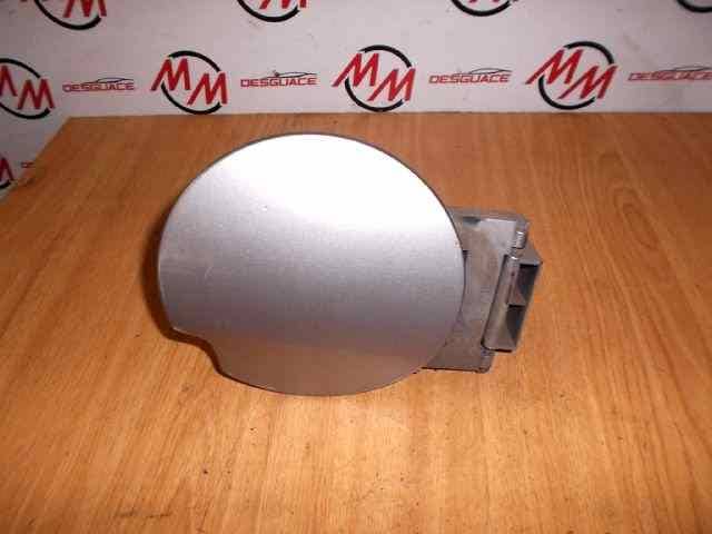 TAPA EXTERIOR COMBUSTIBLE